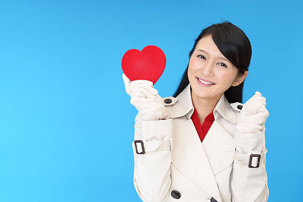 istock Woman holding a red heart 637921600