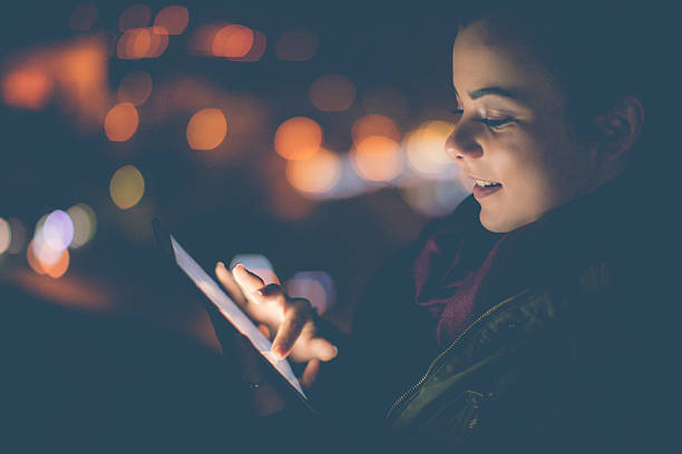 istock Young woman having fun on her tablet 637922584