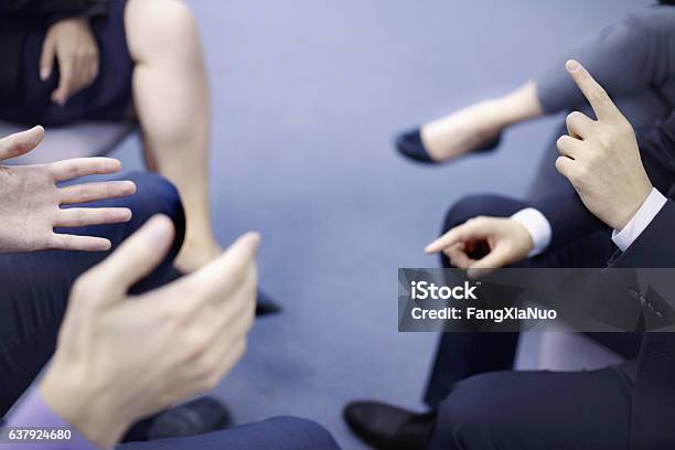 Hands Of Business People Interacting In Office Meeting Stock Photo - Download Image Now
