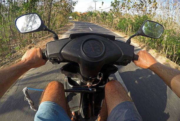 istock Man driving scooter in Bali, personal perspective 637924944