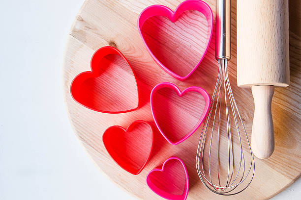 istock Baking heart shaped cookies for St. Valentine's day. 637926870