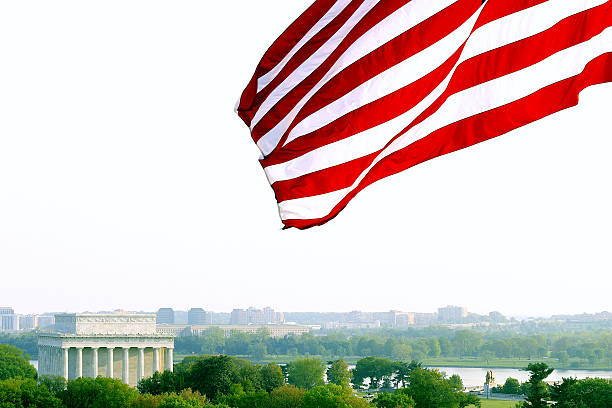 istock Lincoln Memorial and Flag 637926978