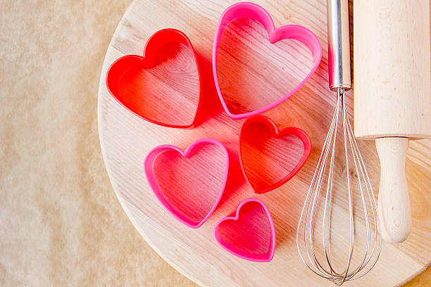 istock Baking heart shaped cookies for St. Valentine's day. 637927022