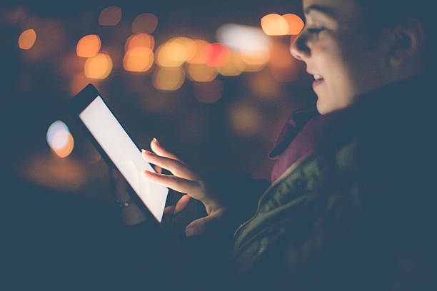 istock Young woman having fun on her tablet 637927154