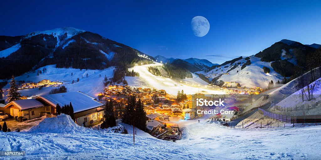 Ski resort village panorama alpine mountains landscape Alps skiing snowboard vacation Saalbach Hinterglemm valley Skiing Stock Photo