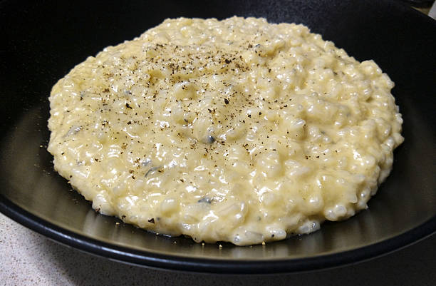 Risotto with gorgonzola and pear stock photo