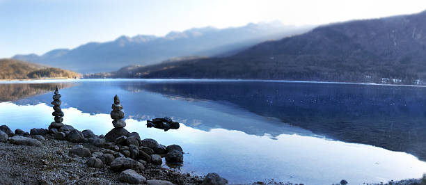 La Pinilla reservoir and snow in the Peñalara massif in winter. Madrid.