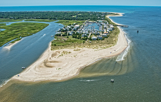 Bald Head Island, historically Smith Island, is a village located on the east side of the Cape .... Frying Pan Shoals, many vessels decided to enter the Cape Fear through New Inlet at Fort Fisher, about 7 miles (11 km) north of Bald Head Island.