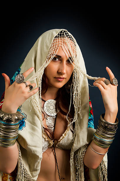 istock Young attractive retro model in old-fashioned wild clothing dancing 637931348