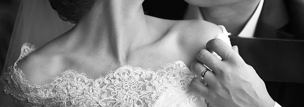 istock Newlywed couple embracing. 637931954