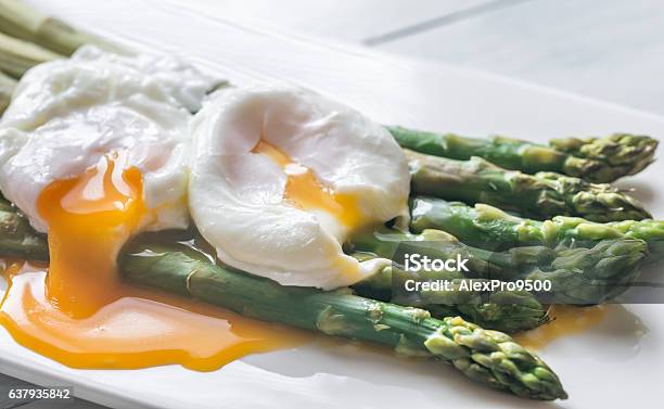 Steamed Asparagus With Poached Eggs Stock Photo - Download Image Now - Egg - Food, Asparagus, Poached Food