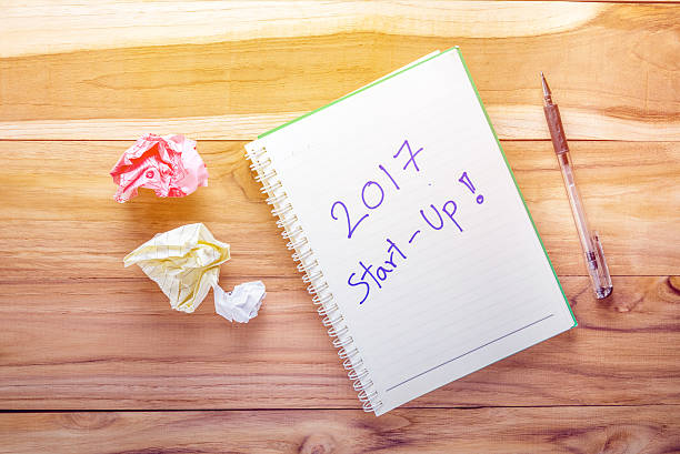 istock Top view 2017 notebook on wooden desk 637937934