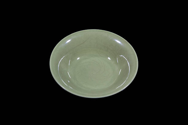 istock Soup green plate on black background from high angle 637939306