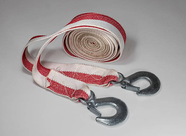 istock Tow rope to the car on a light background. 637939488