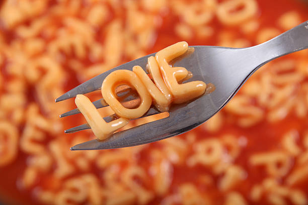 Spaghetti letters spelling the word Love.