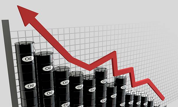 istock oil barrels and a financial chart on white background. price 637943626