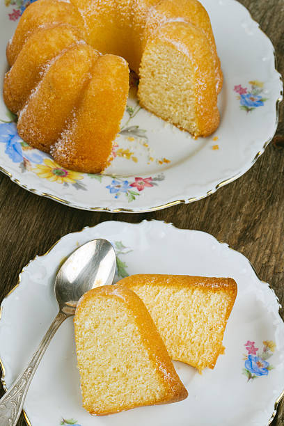 istock freshly cut cake on wooden surface 637946004