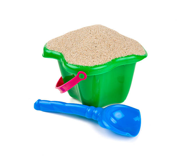 istock beach sand, shovel and bucket 637946678