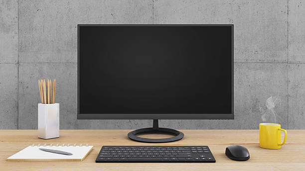 istock Large PC monitor on an office desk 637947530