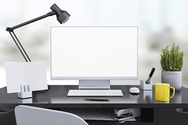 istock Large PC monitor on an office desk 637947562