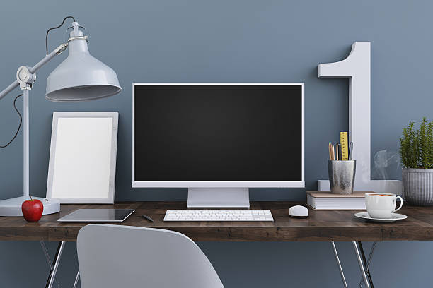 istock Large PC monitor on an office desk 637947588