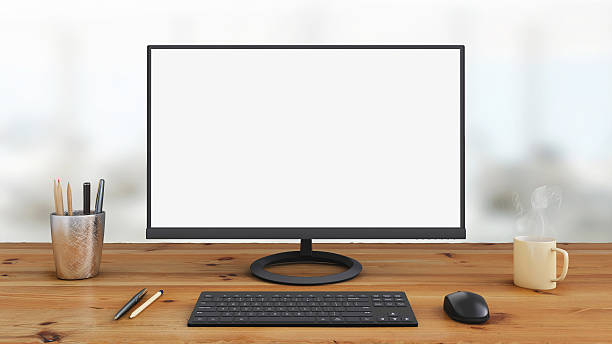 istock Large PC monitor on an office desk 637947598