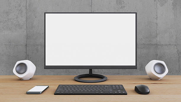 istock Large PC monitor on an office desk 637947638