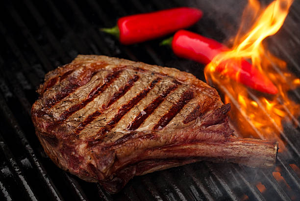 istock food meat - beef steak on bbq barbecue grill with 637953520