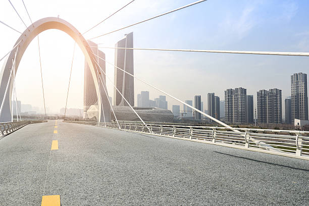 istock modern city road and building 637957516