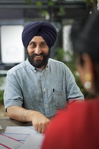 istock Indian Couple Planning Trip Concept 637957686