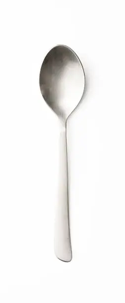 Overhead shot of tea spoon, isolated on white background with clipping path.