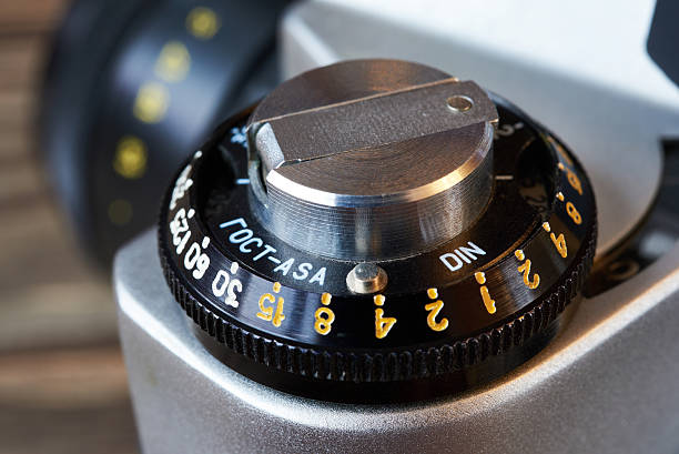 istock Wheel to set control sensitivity to retro SLR camera 637964738