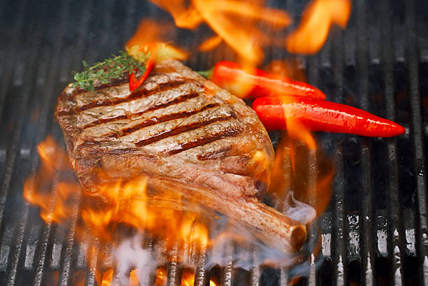 istock food meat - beef steak on bbq barbecue grill with 637967734