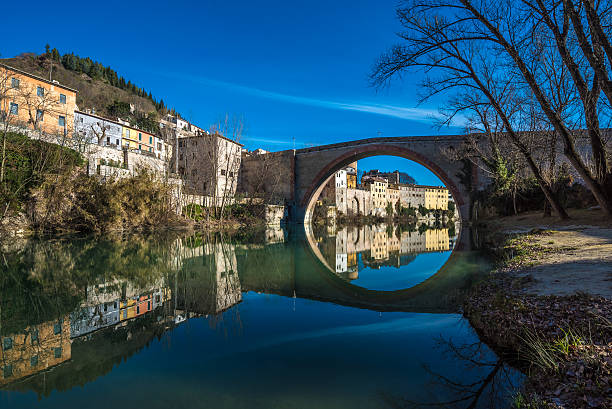 Fossombrone (Marche, Italy) A town with river bridge in Marche region, during the Christmas holiday marche italy stock pictures, royalty-free photos & images