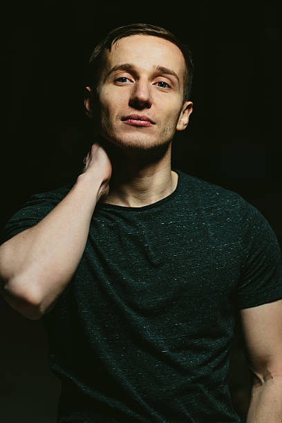 istock Portrait of a serious Young Man by night 637972312