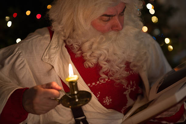 istock Santa Claus reading at Home 637974804