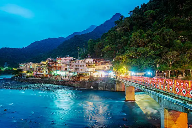 View of Wulai village at night with river and mountains