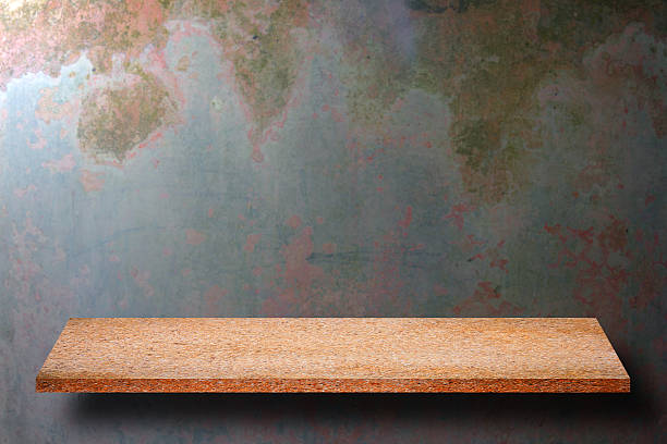 istock Empty top of natural stone shelves and stone wall 637975124
