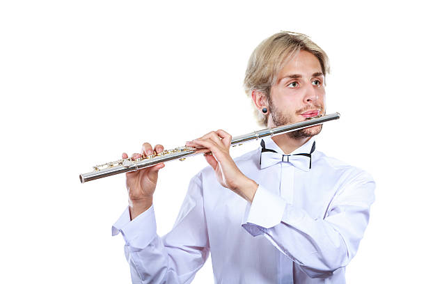 istock Male flutist playing his flute 637975426