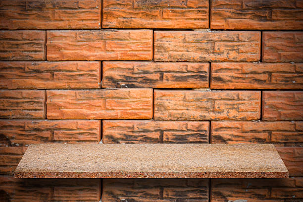 istock Empty top of natural stone shelves and stone wall 637976080