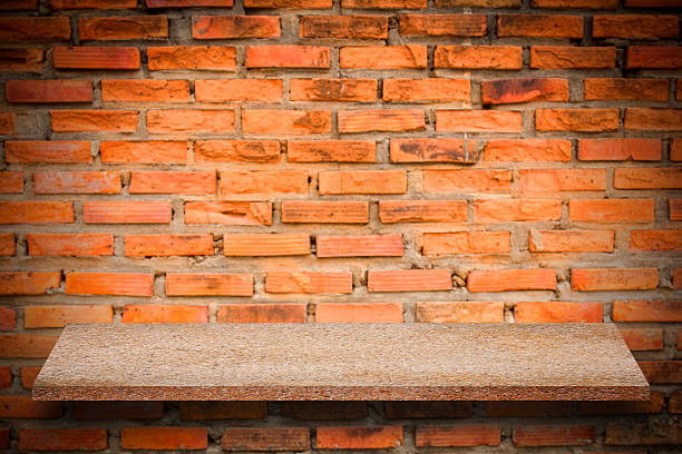istock Empty top of natural stone shelves and stone wall 637977422