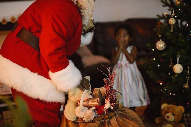 istock Santa Claus with Child 637977882