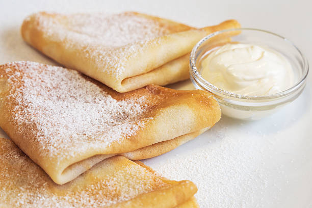 istock Crepes with cream and sugar 637980642