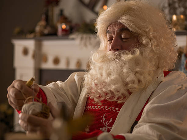 istock Santa Claus at Home closeup portrait 637985236