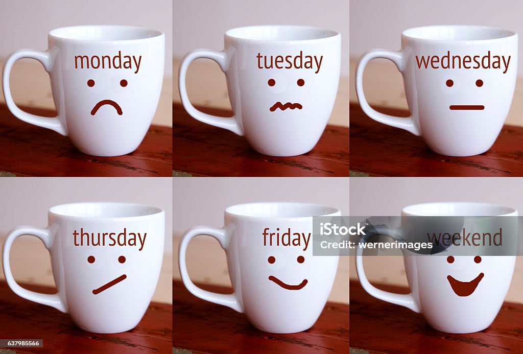 six cups with the words of days of the week six cups with the words of days of the week and drawn faces Afternoon Tea Stock Photo