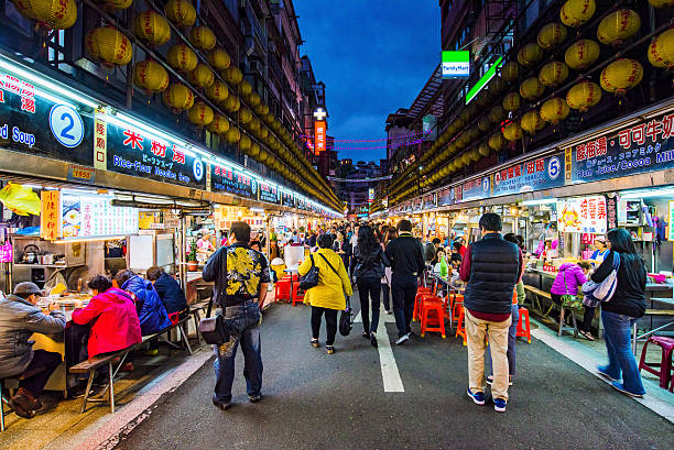 This is Keelung night market Keelung, Taiwan - November 28, 2016: This is Keeelung night market a famous night market where people go to eat in Keelung city near Taipei chinese ethnicity china restaurant eating stock pictures, royalty-free photos & images