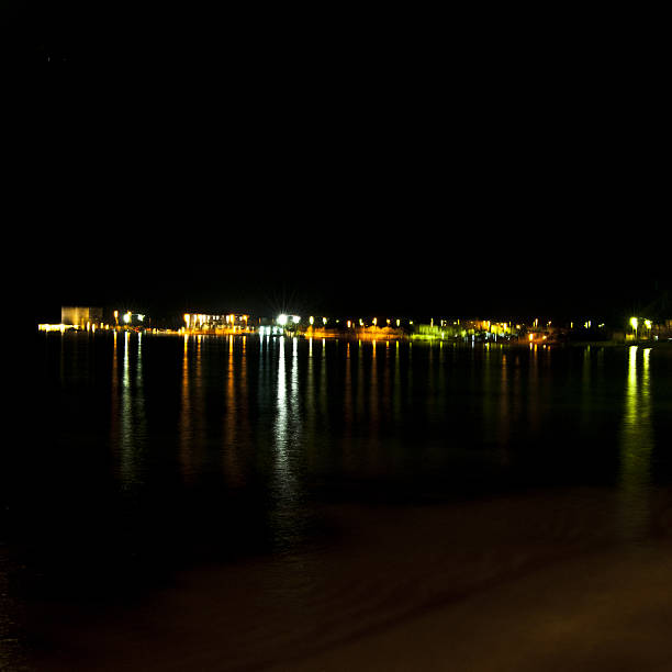 istock street lights at night on the sea 637988862