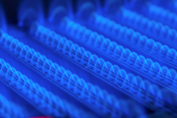 burning gas in water heater furnace - flame gas natural gas blue imagens e fotografias de stock
