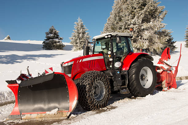 istock Red tractor for snow removal 637989376