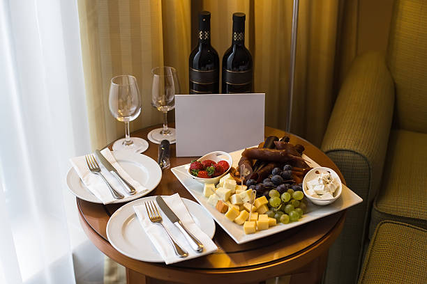 istock Beautifully arranged grapes and cheese with red wine on the 637990670